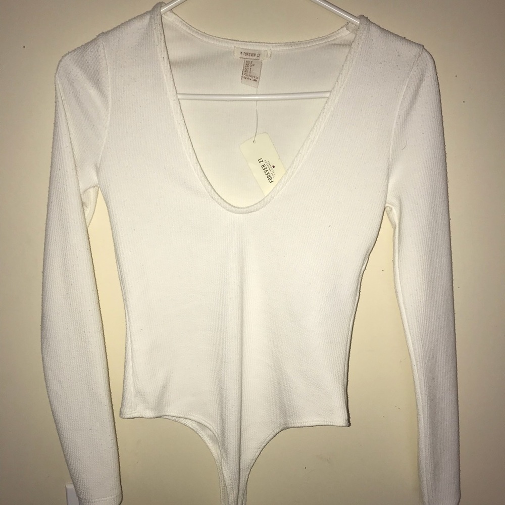 F21 Low plunge cream body suit
